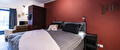 Kamer De Smederij met rode wand